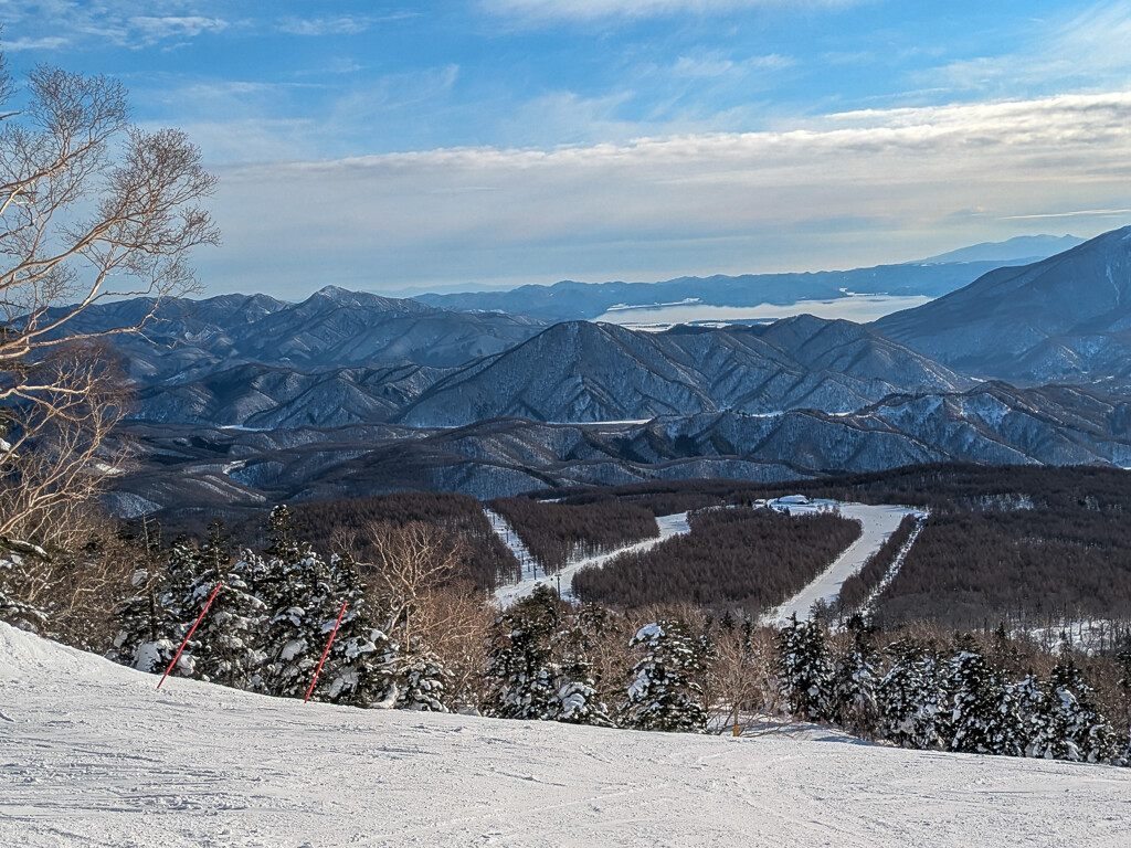 Sannokura in Japan - a person on a snowboard on a mountain.