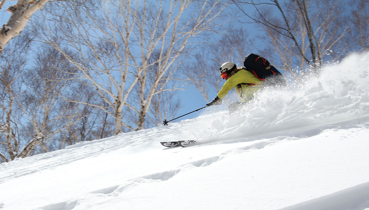 Maeyama in Japan - a person skiing down a snow covered slope.
