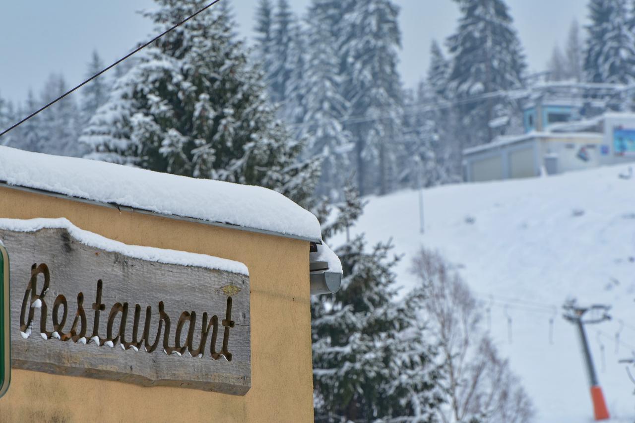 Bublava – Bleiberg in Czech Republic: snow on the roof of the building.