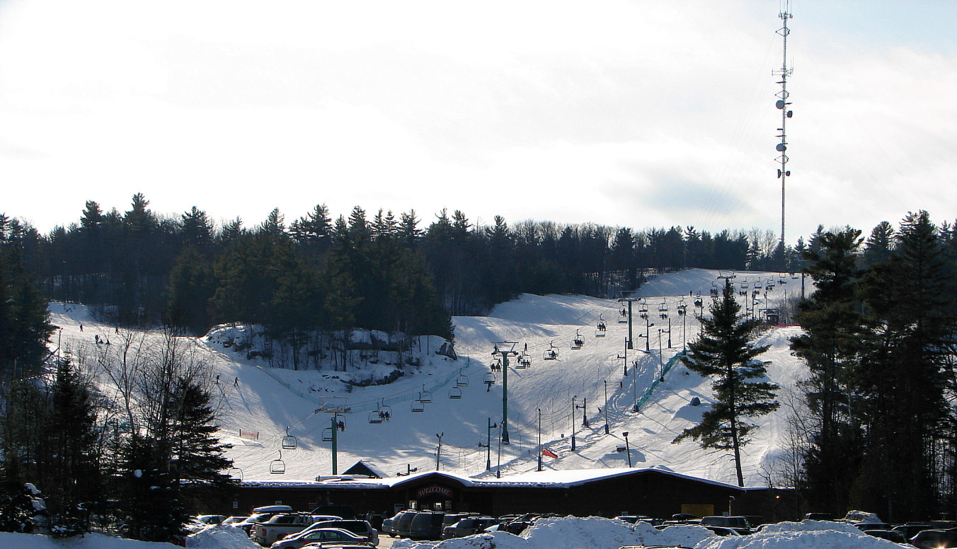 Mount Pakenham in Canada - a snow covered ski slope with a ski lift.