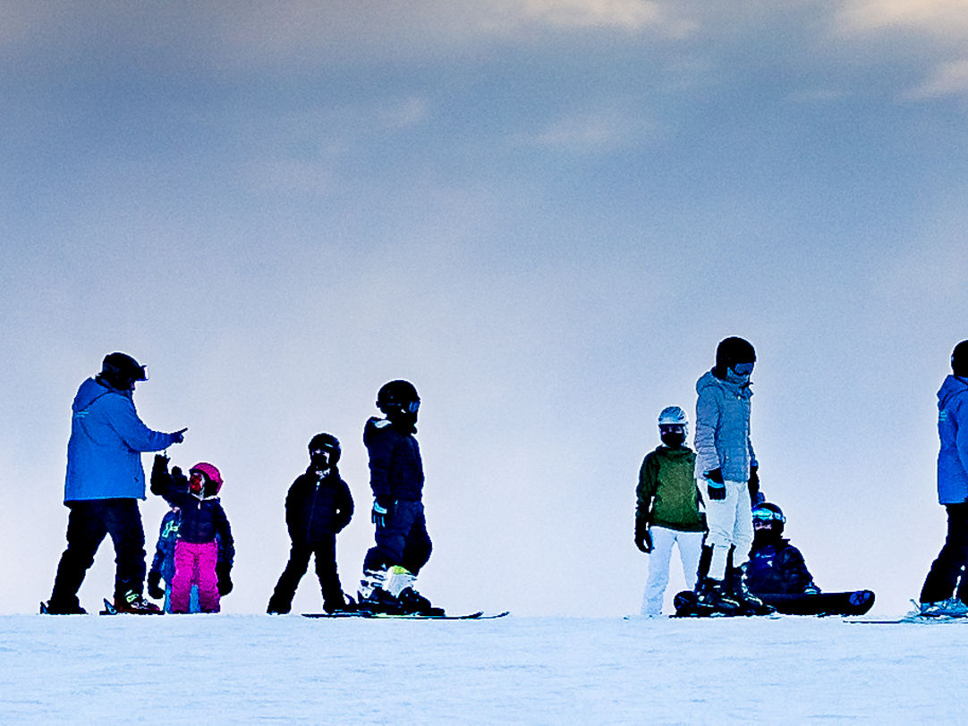 Alpine Valley Ohio in USA - a group of people standing in the snow.