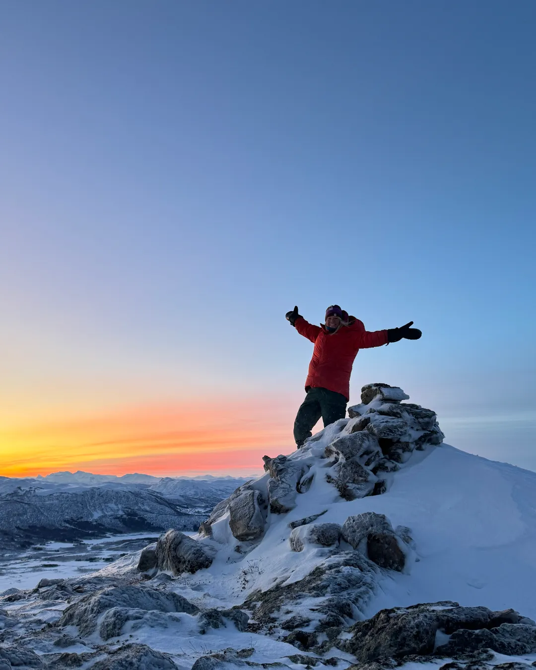 Sollifjellet in Norway - a man standing on top of a snow covered mountain.