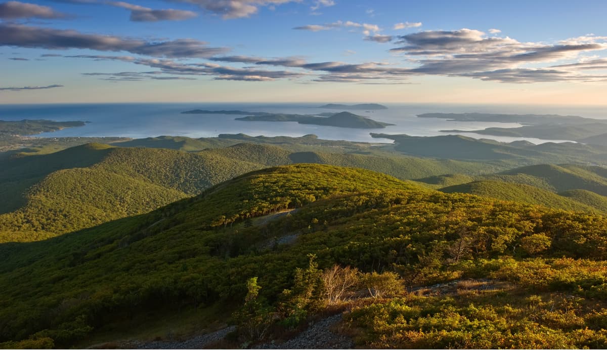 Sinyaya Sopka – Artyom in Russia - a view from the top of a mountain at sunset.