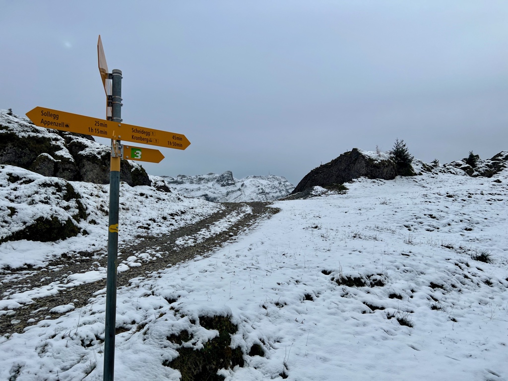 Sollegg – Appenzell in Switzerland - a sign on the side of a snowy mountain.