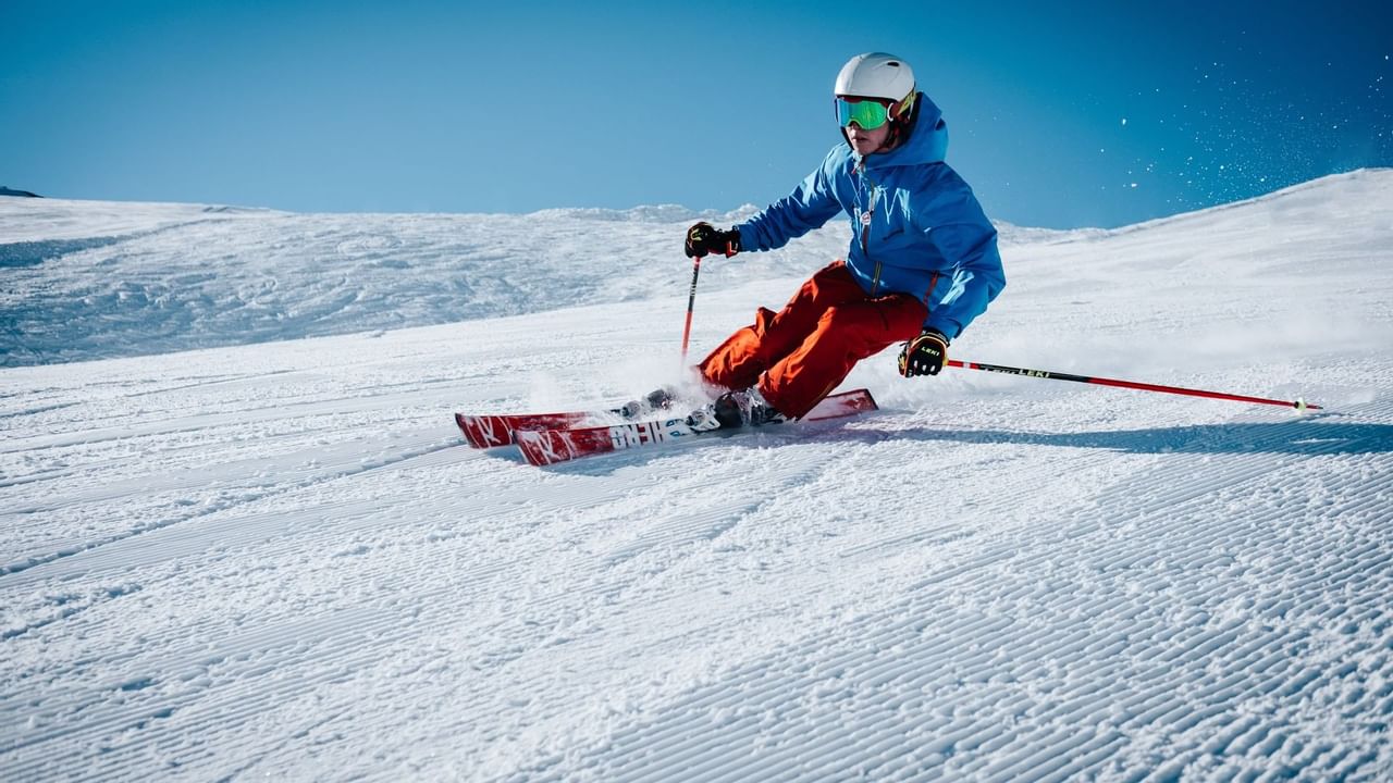 Rabbit Hill Snow Resort in Canada - a person skiing down a snowy slope.