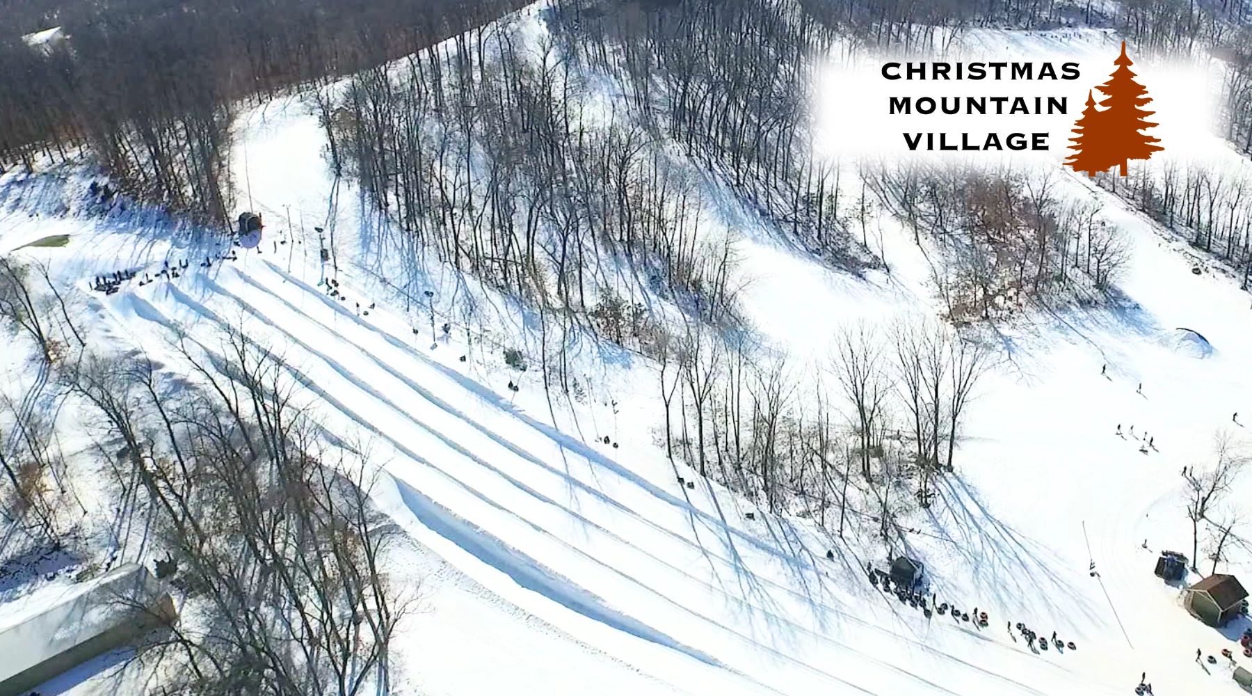 Christmas Mountain in USA - a view of a ski slope with trees in the background.