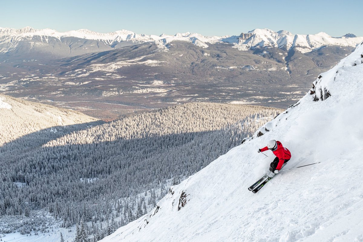 Marmot Basin in Canada - a person skiing down the side of a mountain.