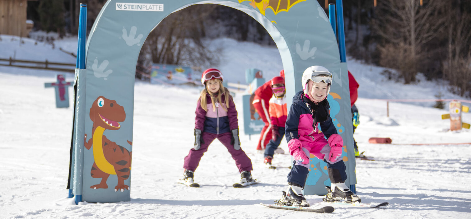 Piane di Mocogno in Italy - a group of children playing in the snow.