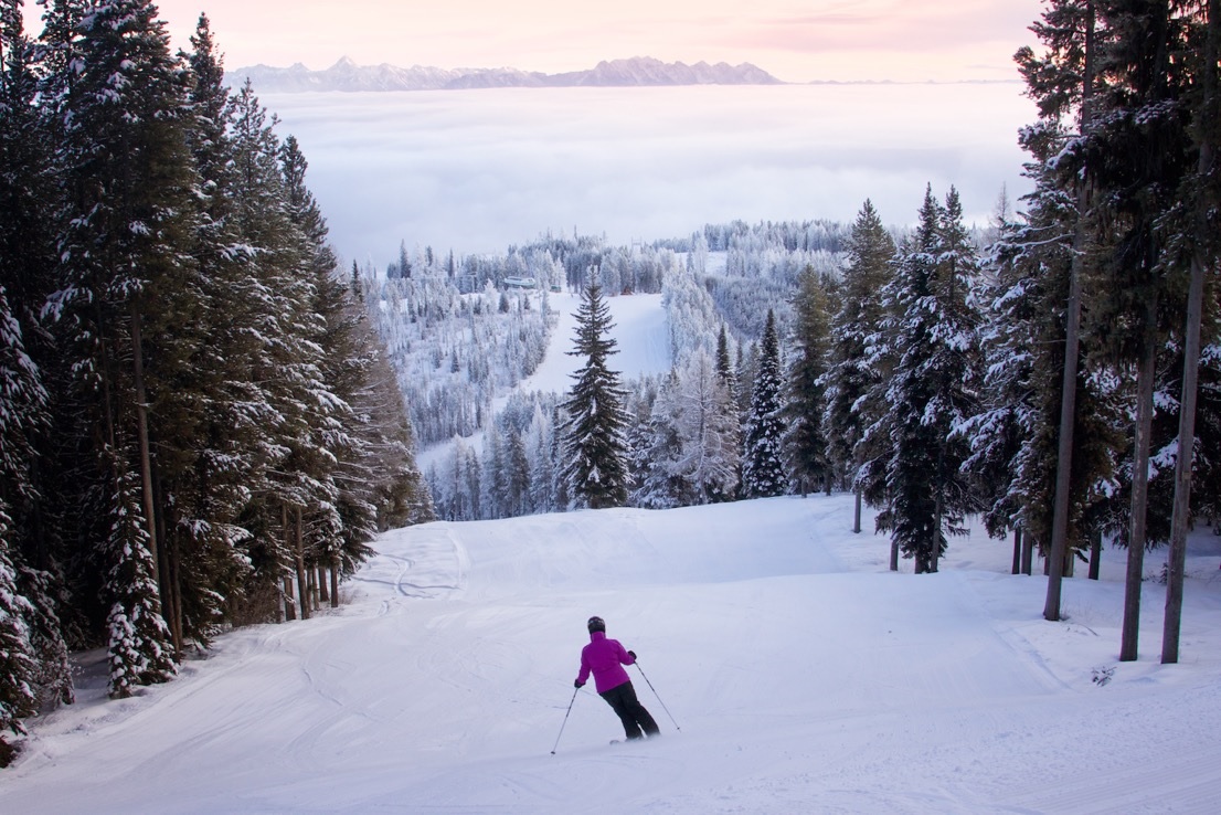 Kimberley in Canada - a person skiing down a mountain covered in snow.