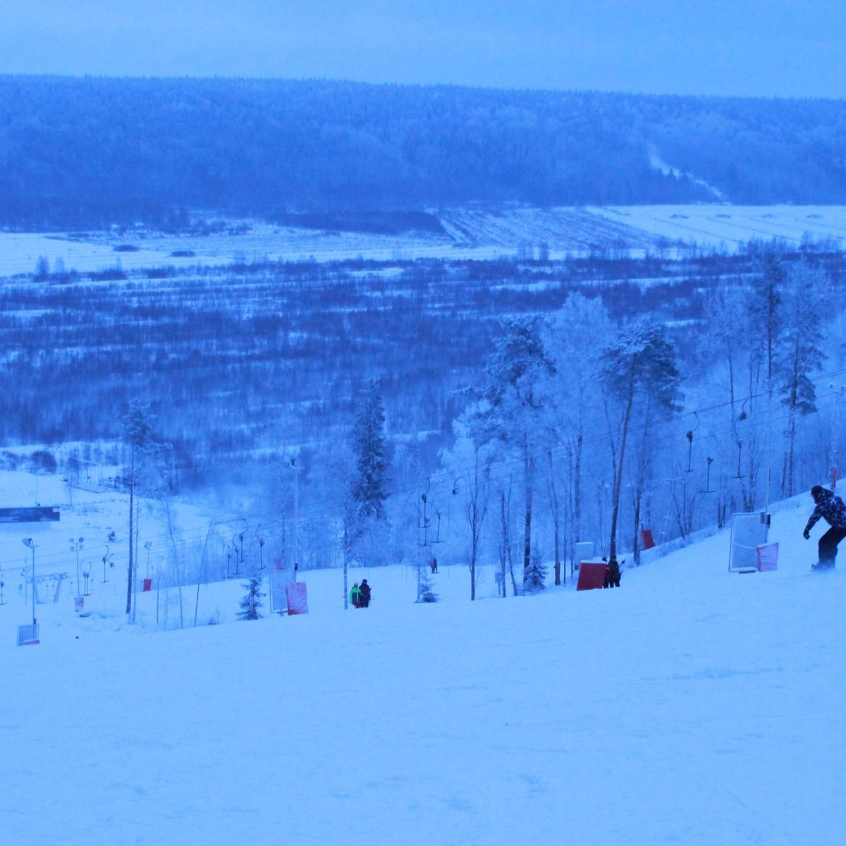 Zolotaya Dolina in Russia - a person on a snowboard in the snow.