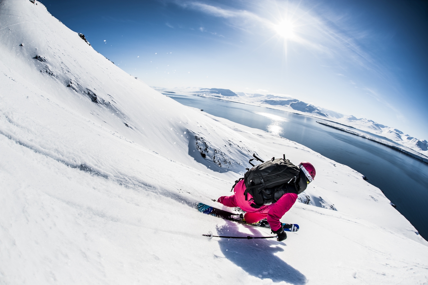 Solheisen Skisenter in Norway - a person on a snowboard going down a snowy hill.