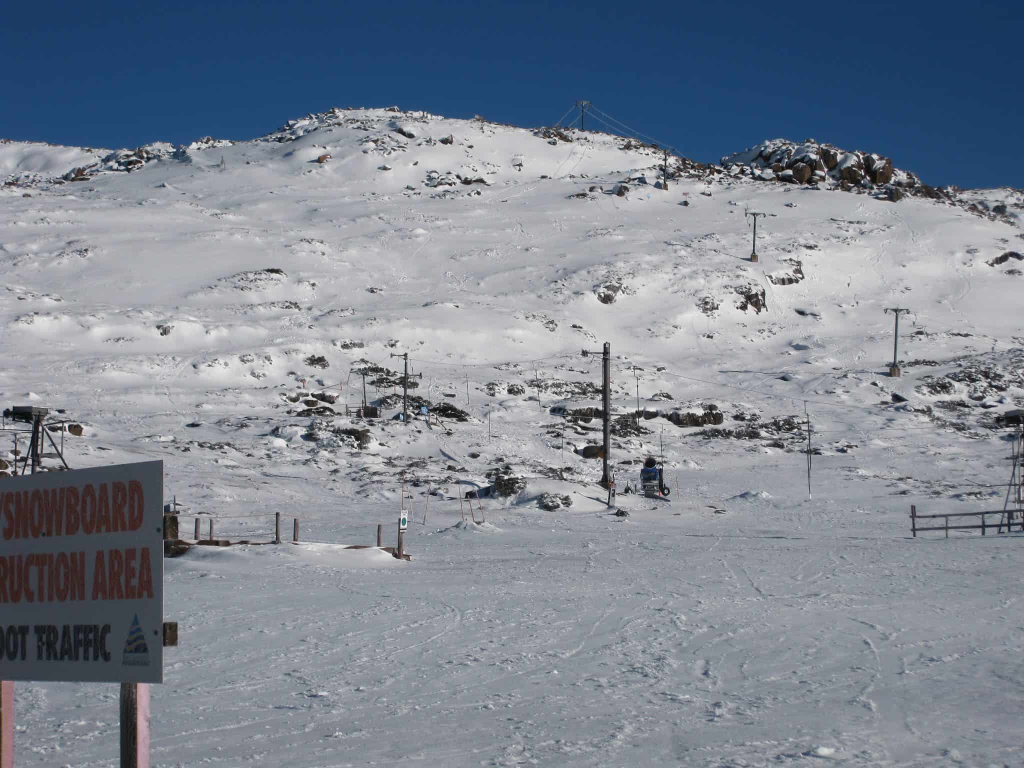 Image of the Ben Lomond Chalet in Tasmania, Australia. The chalet is part of a ski resort, showing a scenic winter landscape with a ski lift in the background.