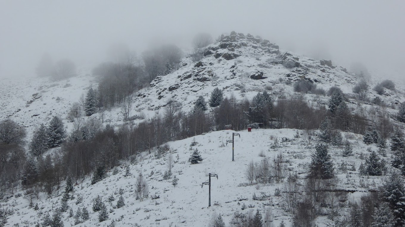 Nizhepole in North Macedonia - a ski lift going up a snowy mountain.