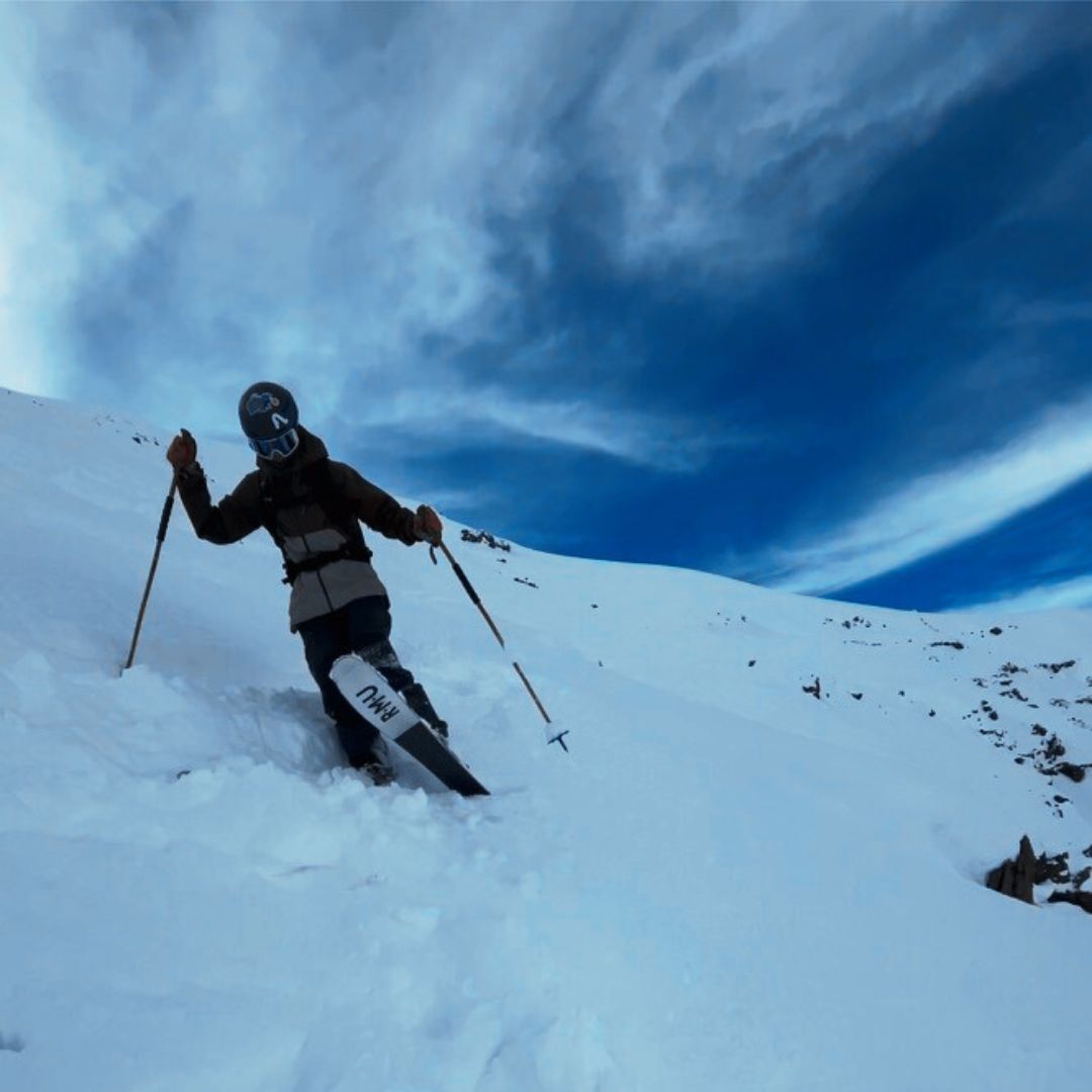 Gurtis | ​Bazora in Austria - a person skiing down a snow covered mountain.