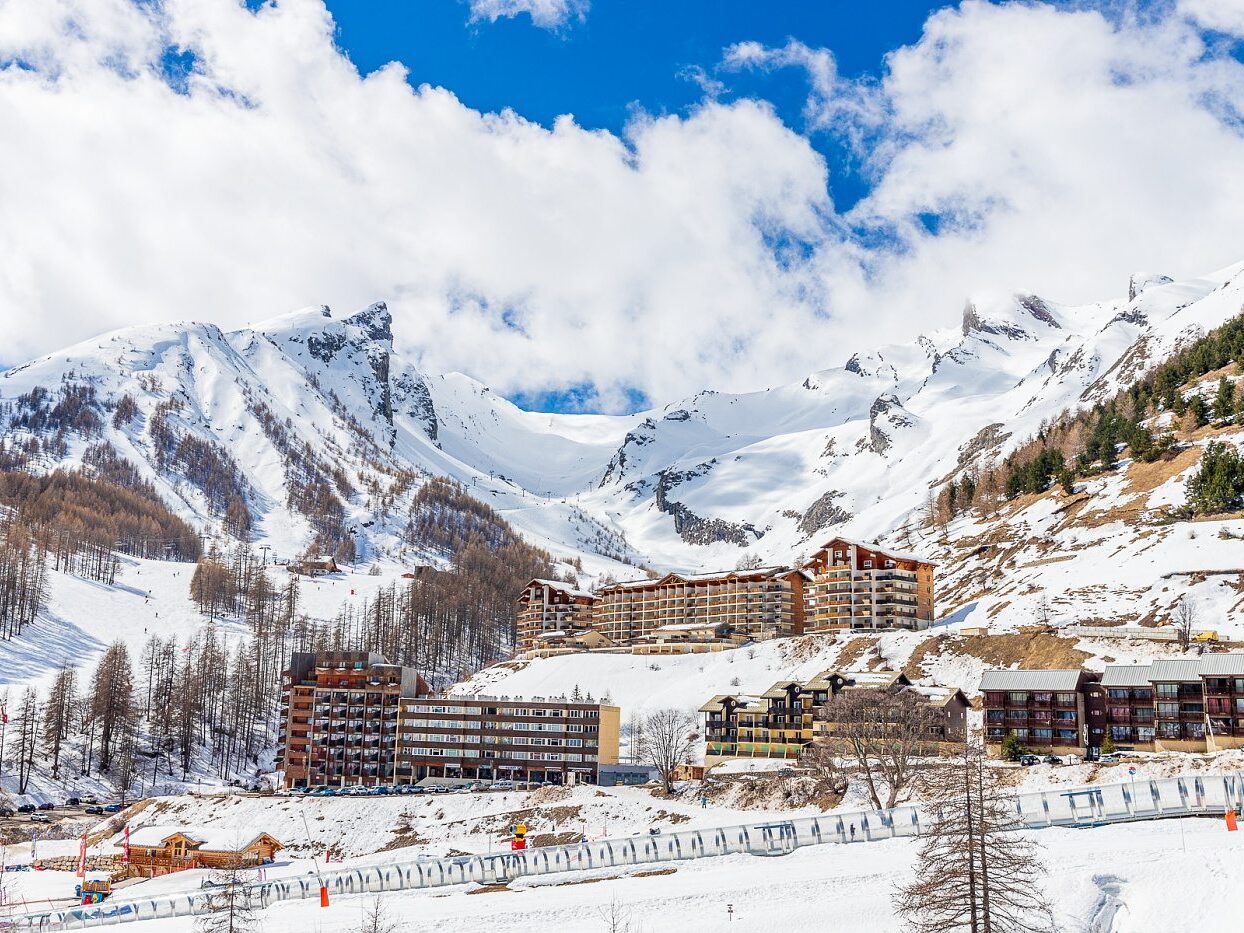 Val d'Allos - Espace Lumière in France: a ski resort surrounded by snow covered mountains.