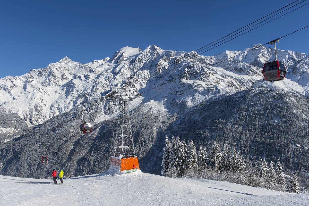 Domaine Skiable des Contamines Montjoie in France - a ski lift going up the mountain.