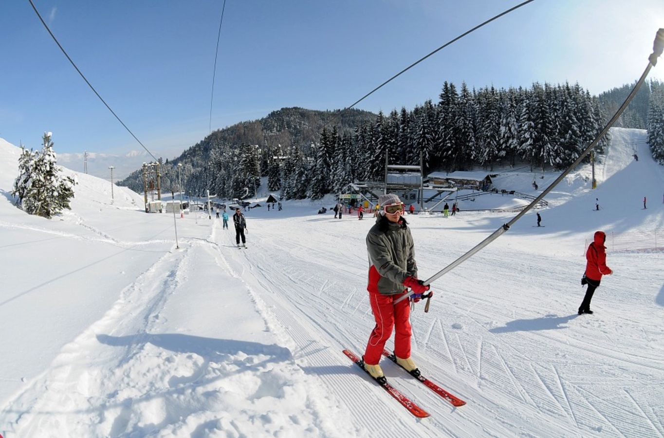Opalisko – Závažná Poruba in Slovakia - a person riding skis down a snowy slope.