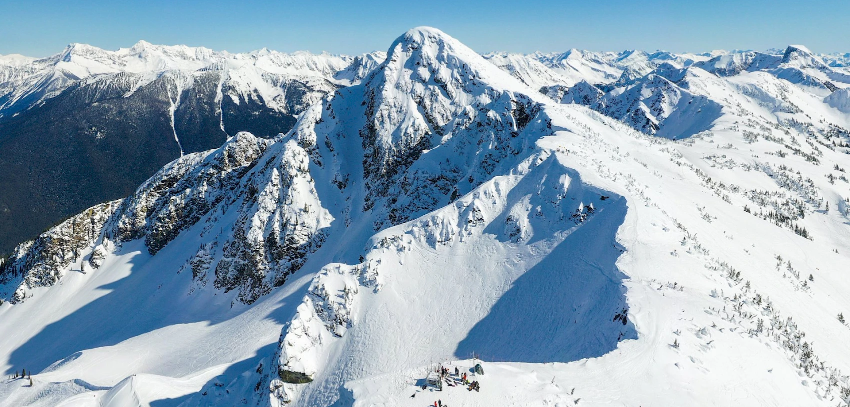 Revelstoke Mountain Resort in Canada - a view from the top of a snowy mountain.