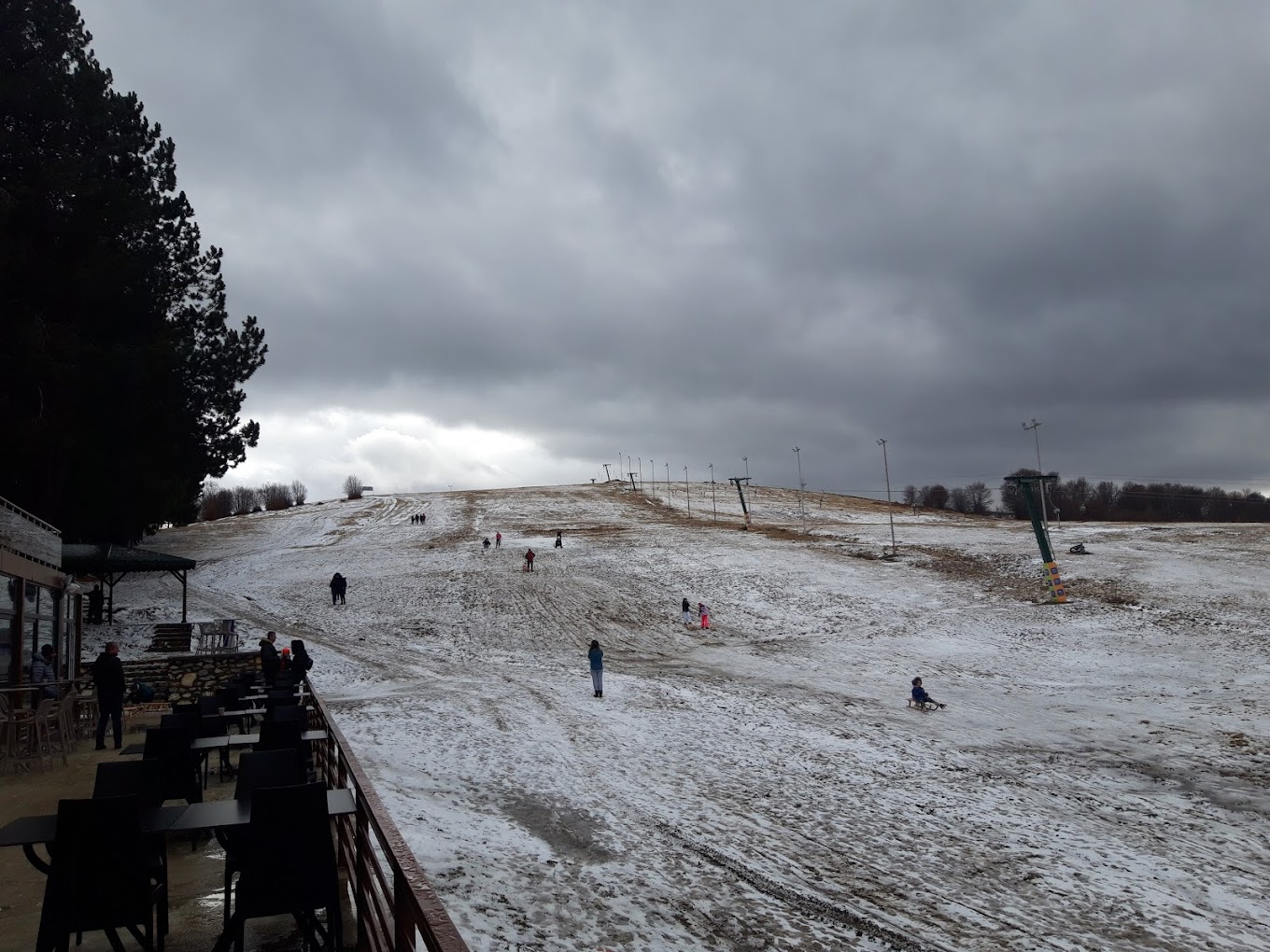 Stanic in North Macedonia - a ski slope covered in snow on a cloudy day.