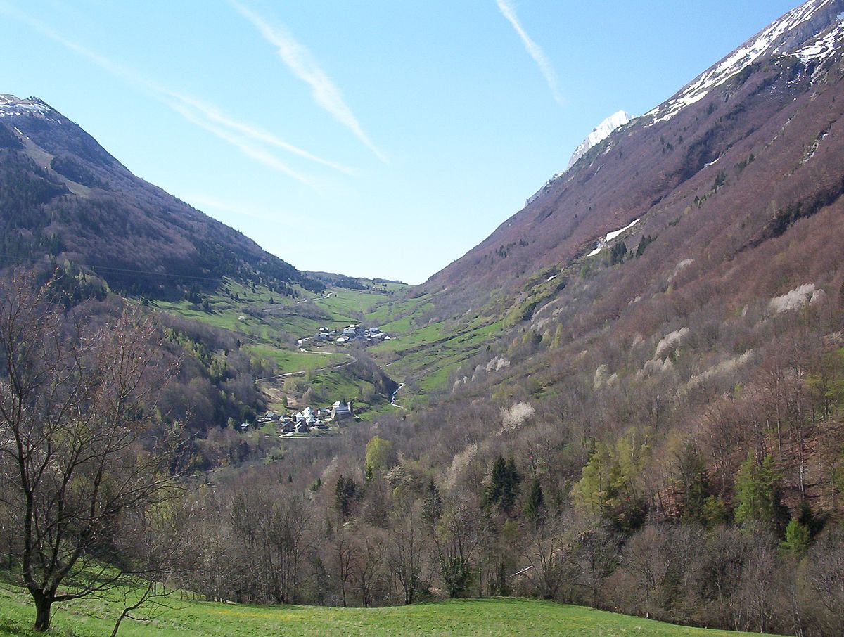 Col d'Ornon in France - a view of a valley with mountains in the background.