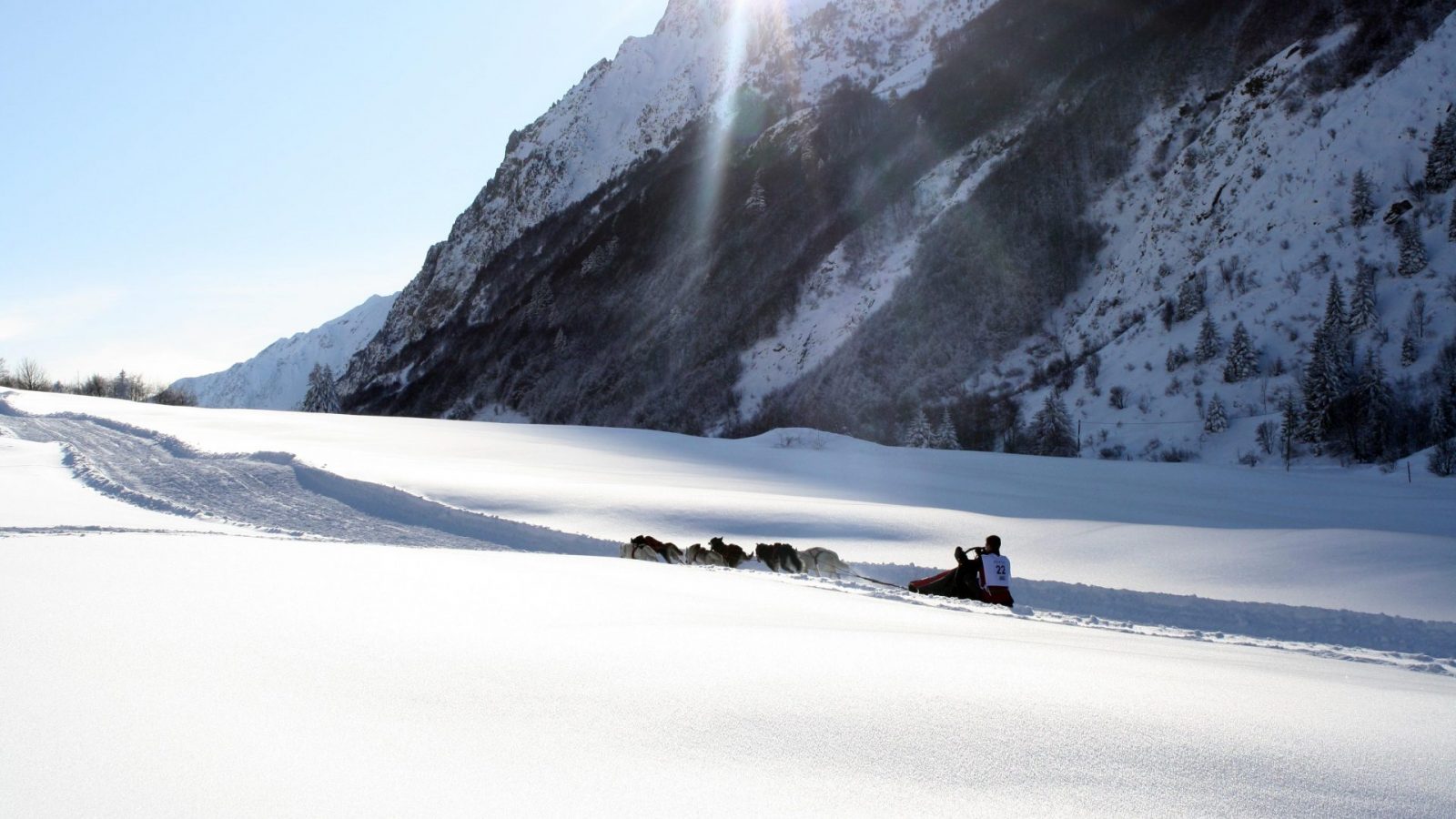 Col d'Ornon in France - a group of people riding horses in the snow.