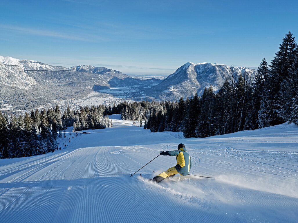 Garmisch Classic in Germany - a person riding skis down a snowy slope.