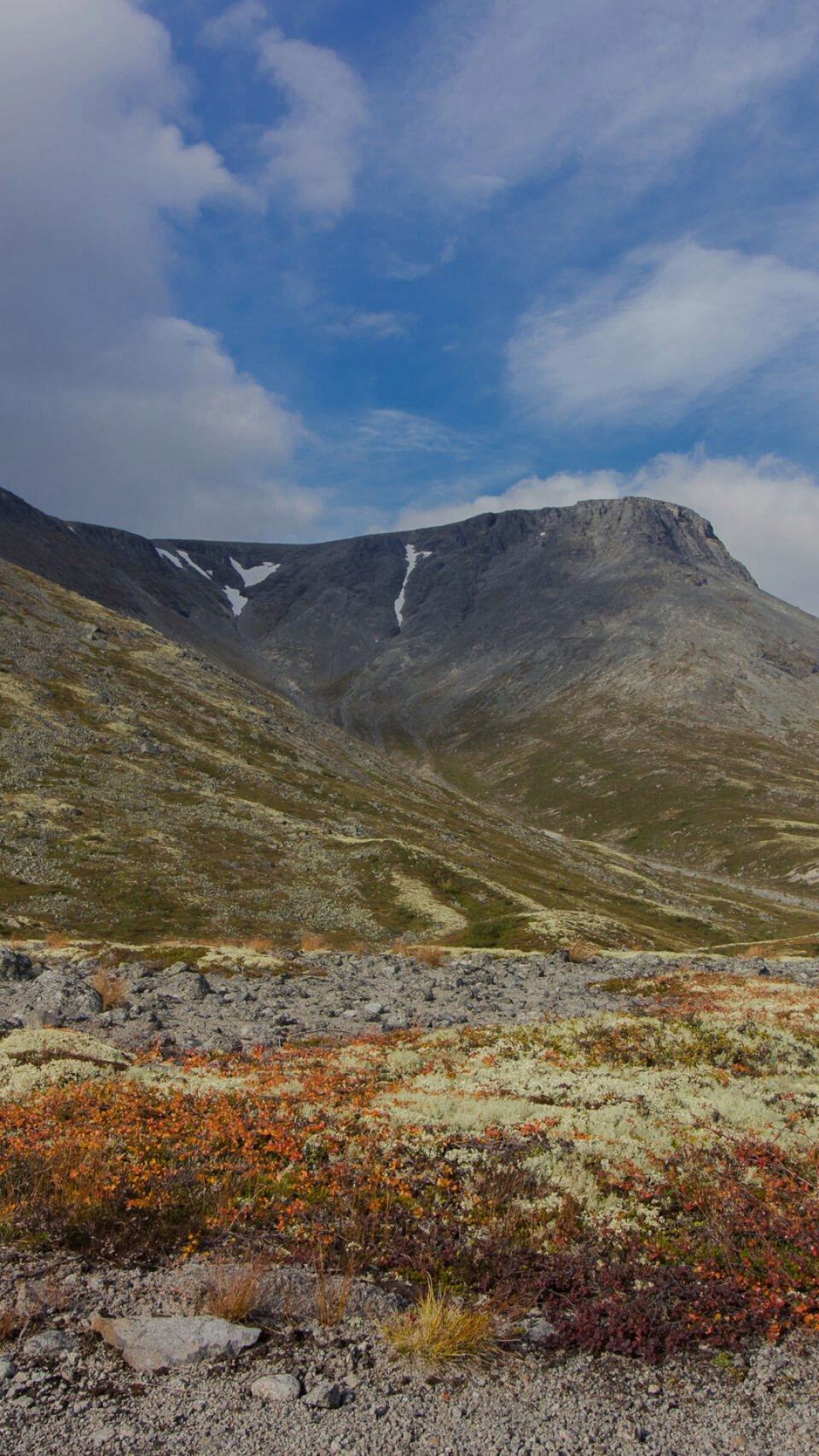Salma in Russia - a rocky area with a mountain in the background.