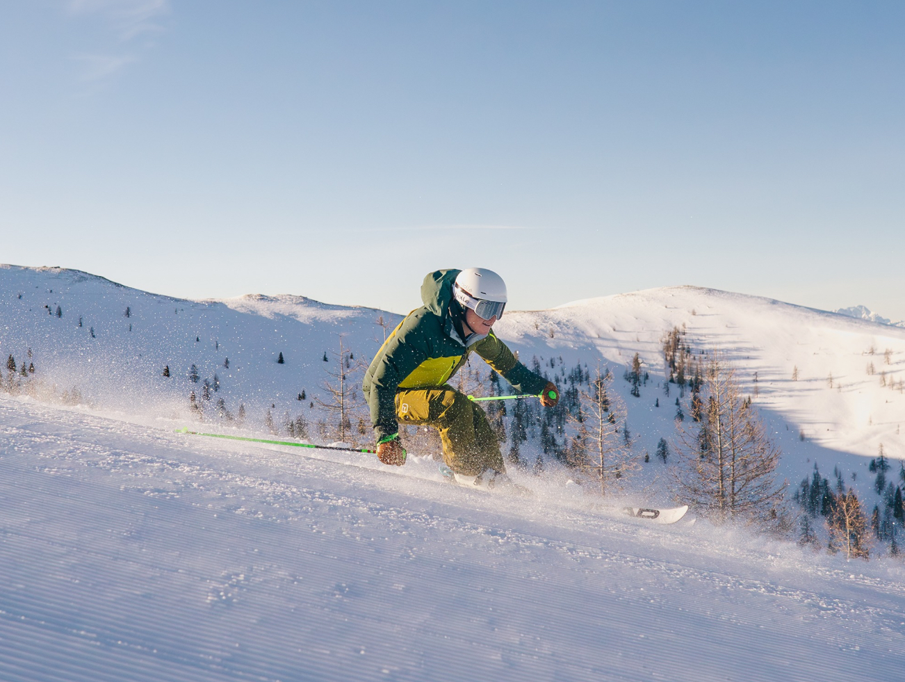 Bad Kleinkirchheim in Austria - a man riding skis down a snow covered slope.
