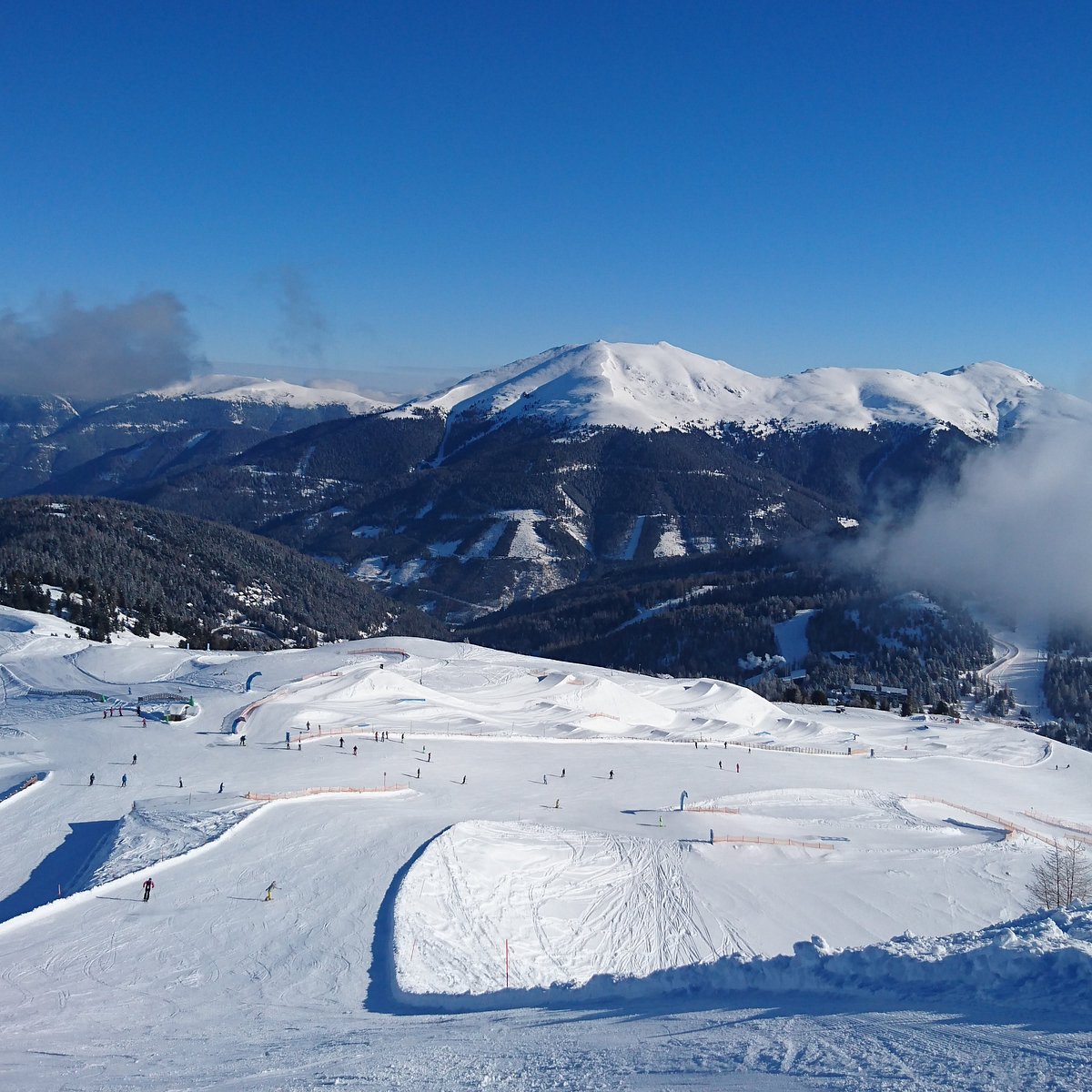 Bad Kleinkirchheim in Austria - a view from the top of a snowy mountain.