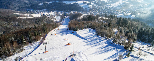 STOK Ski Station in Poland: an aerial view of a ski resort in the mountains.