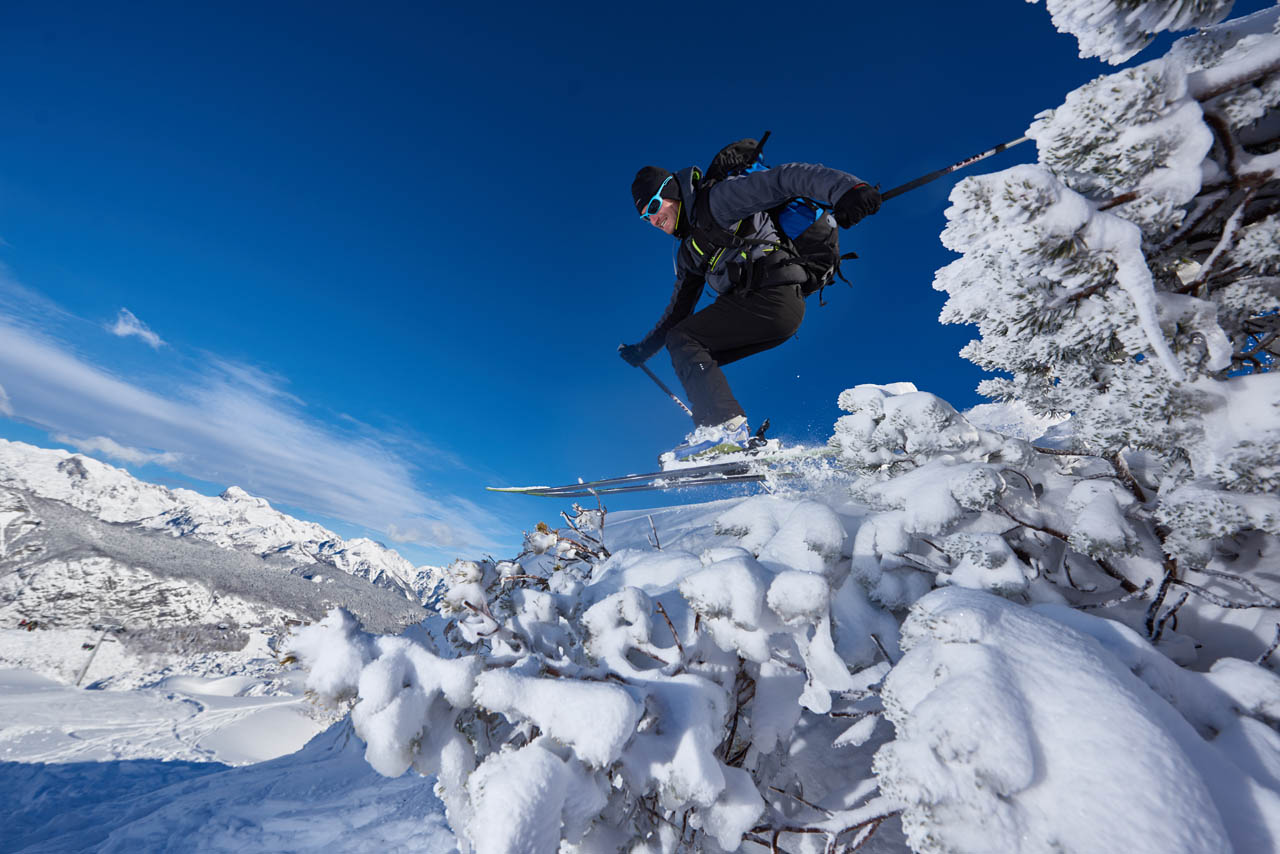Macesnovc Rateče in Slovenia - a person on a snowboard in the snow.