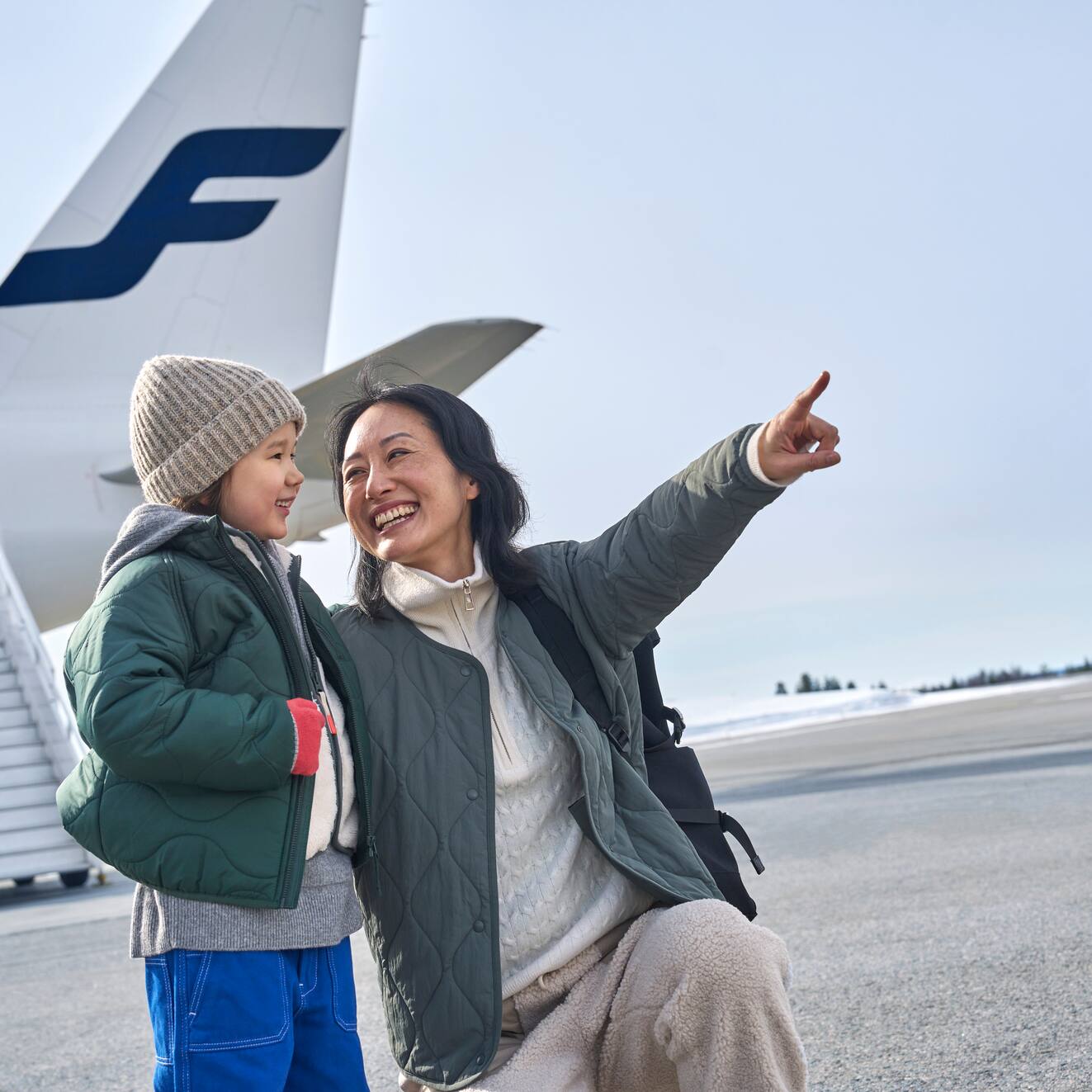Bläsiberg – Wiesensteig in Germany - a woman and child standing in front of an airplane.