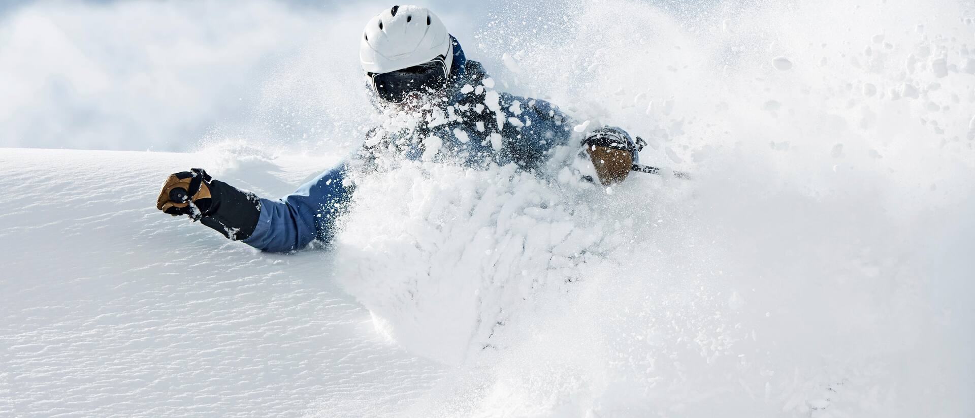 Bläsiberg – Wiesensteig in Germany - a person on a snowboard in the snow.