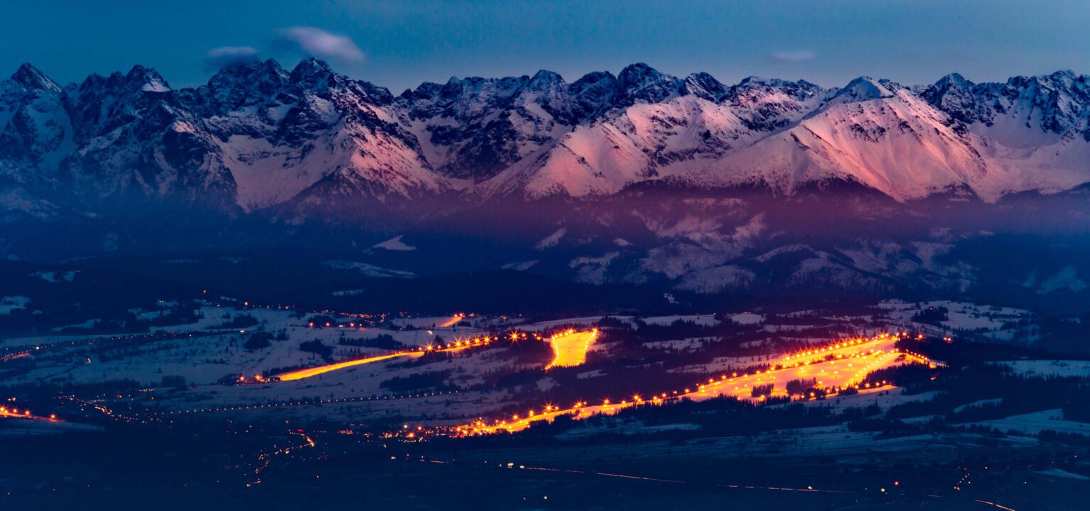 Nosal – Bystre in Poland - a view of the snow covered mountains at night.