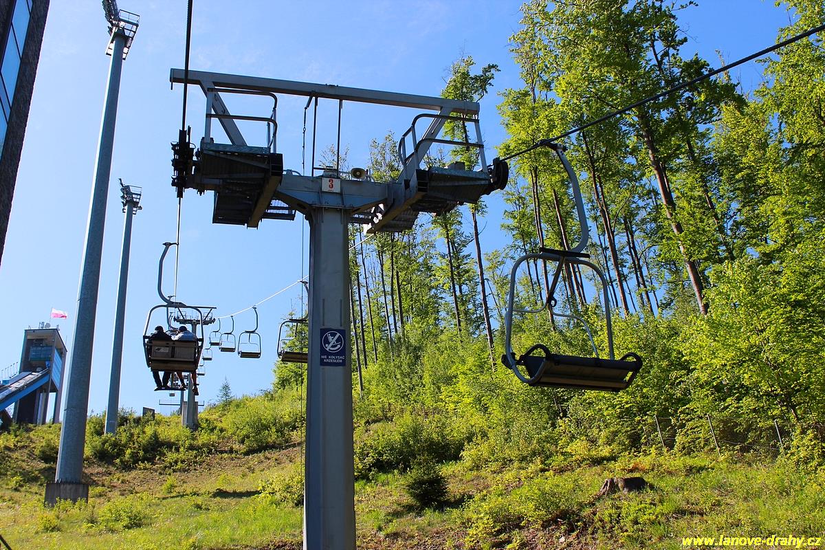 Dolní Lomná – Armáda in Czech Republic - a ski lift going up a hill.