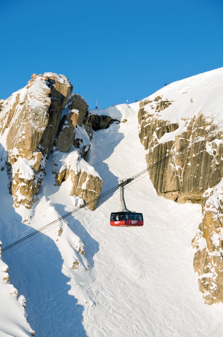 Jackson Hole in USA - a ski lift going up a snowy mountain.