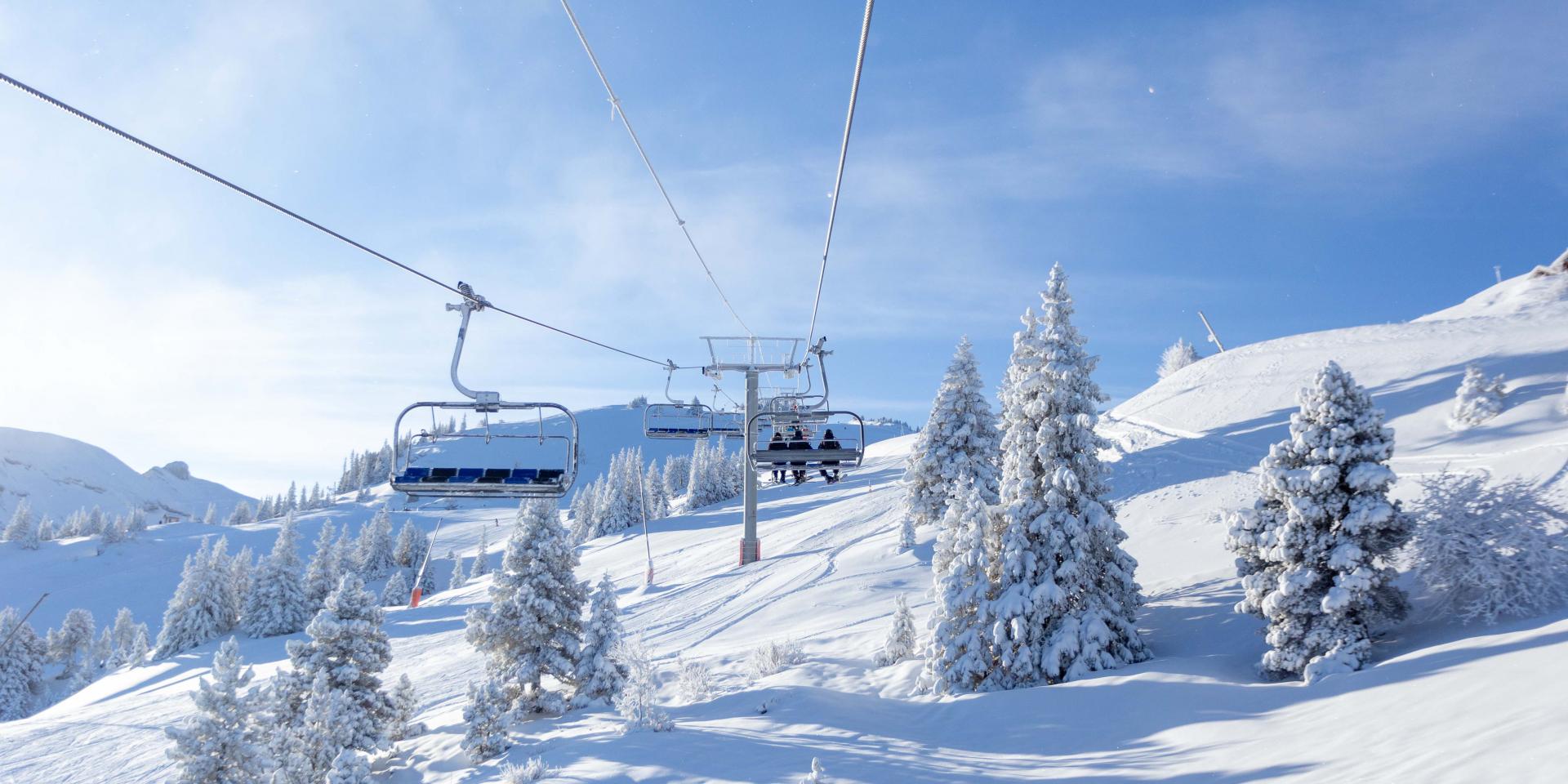 Espace Villard de Lans Correncon in France - a ski lift going up a snowy mountain.