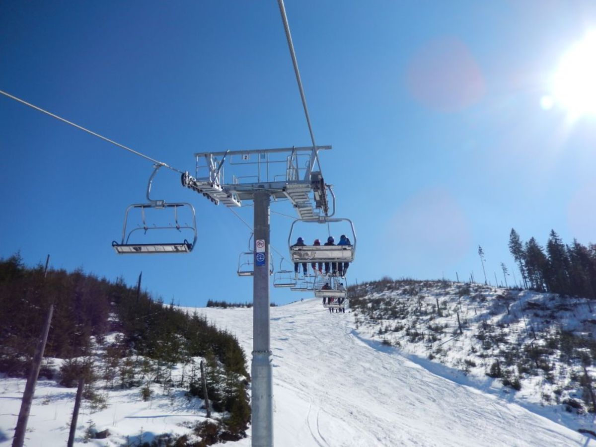 Strednica – Ždiar in Slovakia - a ski lift going up the side of a mountain.
