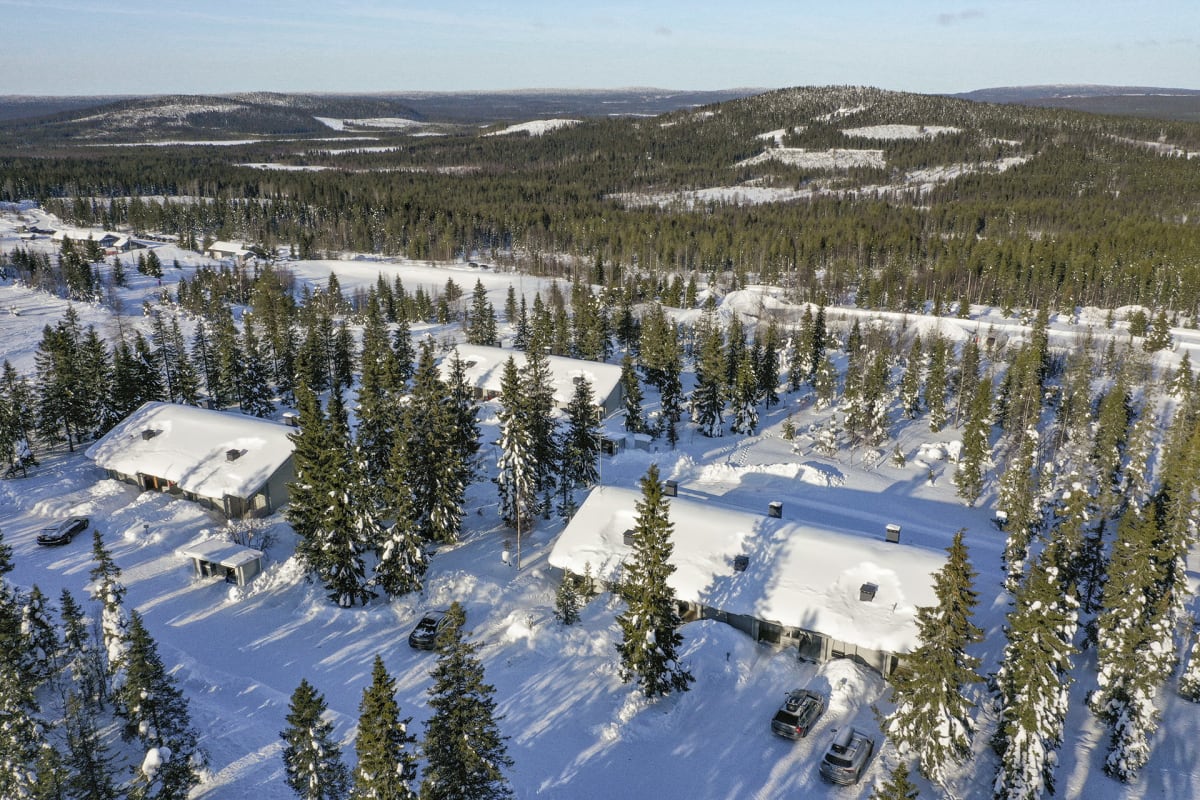 Pikku-Syöte | ​Syötekeskus in Finland: an aerial view of a ski resort surrounded by trees.