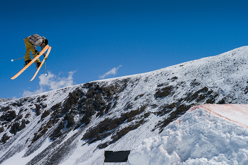 Beartooth Basin in USA - a man flying through the air while riding skis.