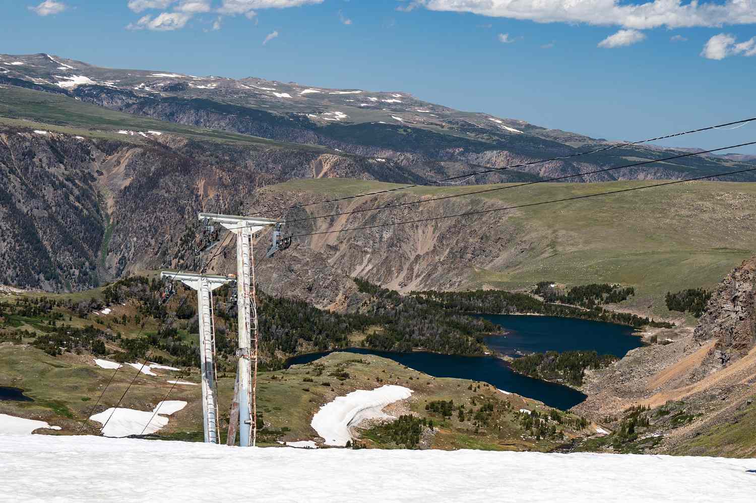 Beartooth Basin in USA - a person on a ski board on a snowy slope.