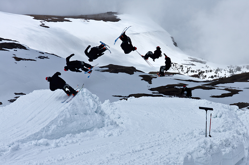 Beartooth Basin in USA - a group of people skiing down a snow covered mountain.