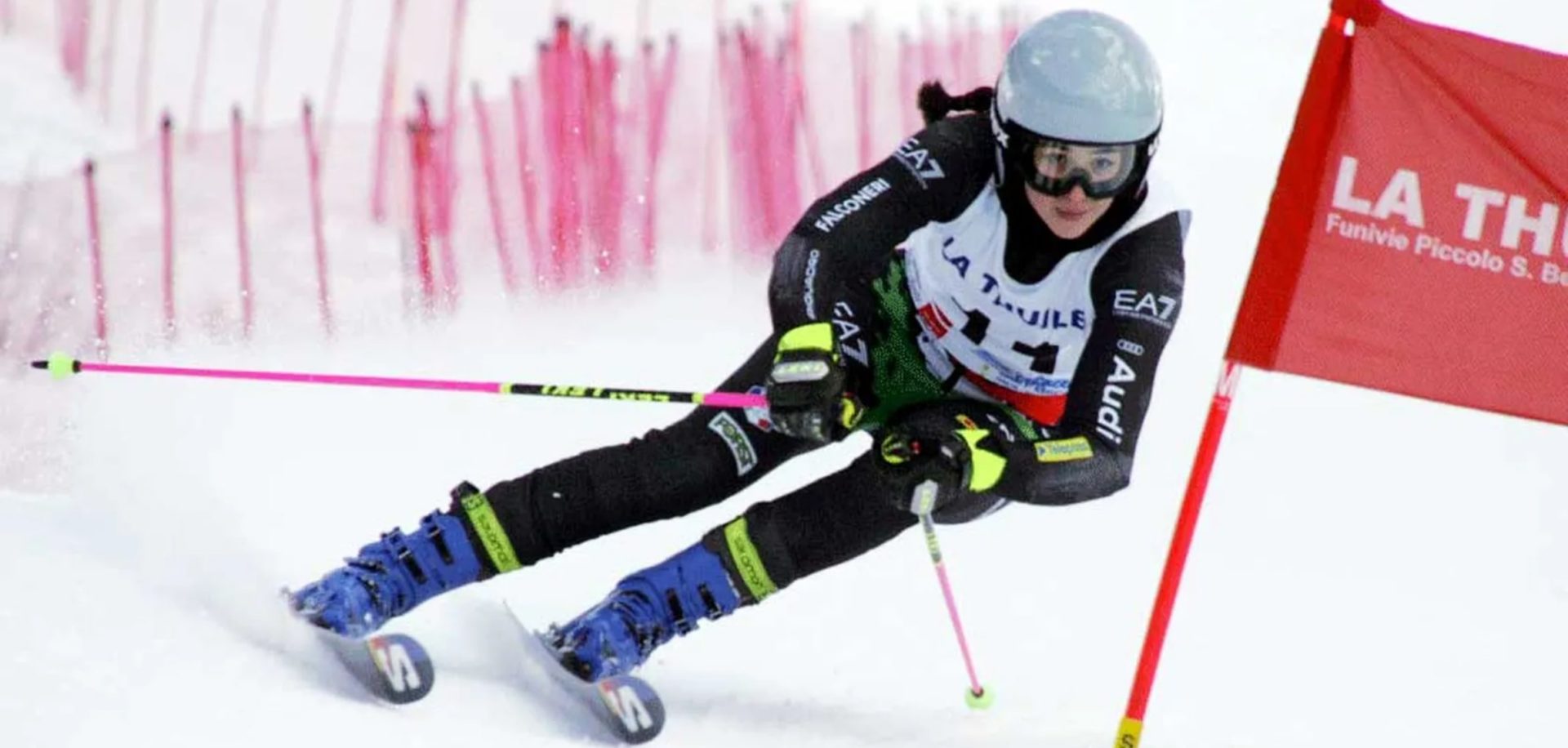 Val Senales Glacier in Italy - a skier is racing down a hill in the snow.