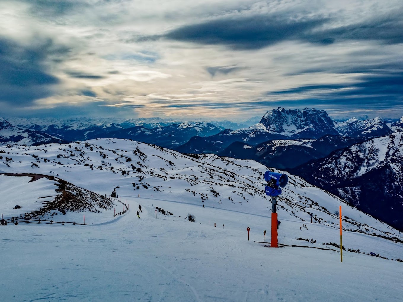 Winklmoos-Steinplatte in Austria - a person standing on top of a snow covered mountain.