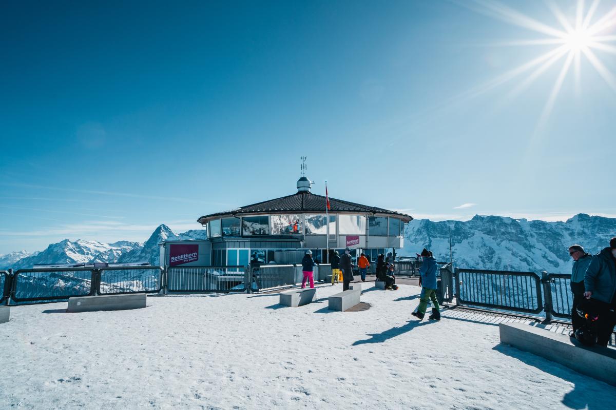 Schilthorn Murren in Switzerland - people on the top of a snow covered mountain.