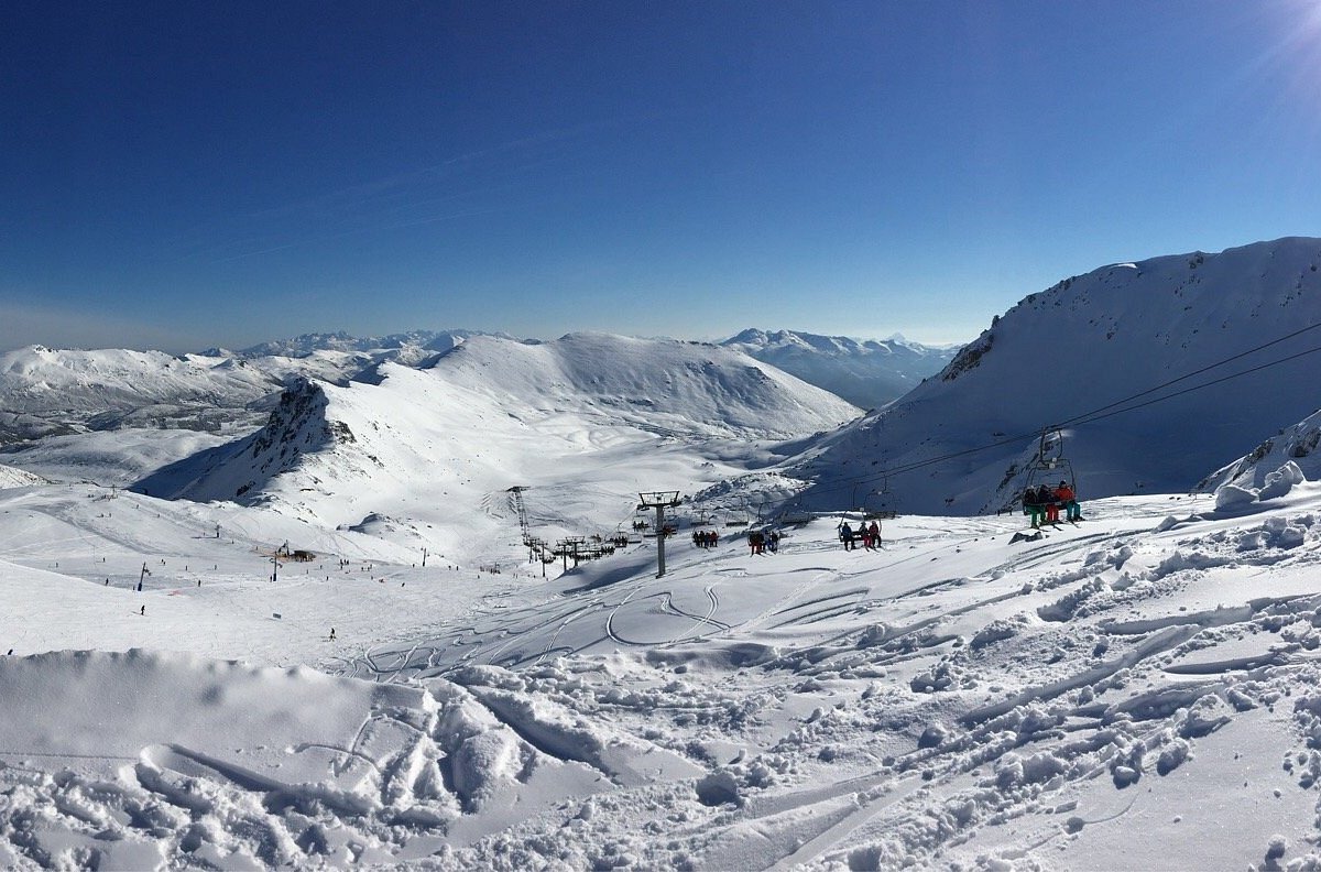 San Isidro-Zona Salencias in Spain - a view from the top of a snowy mountain.