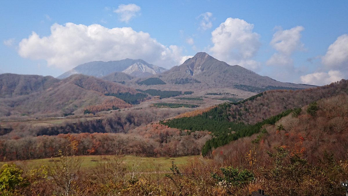 Kagamiganaru in Japan - a view of the mountains from the top of a hill.