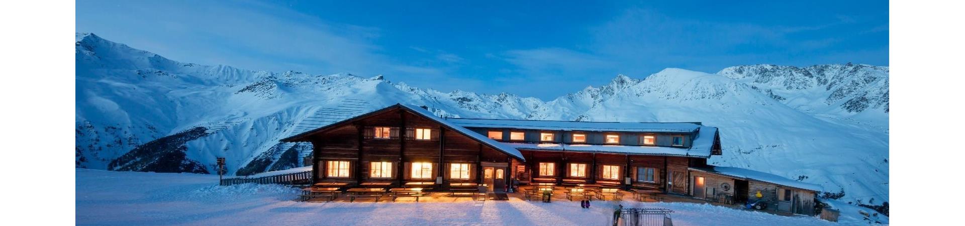 Maseben – Langtaufers in Italy - a house in the snow at night.