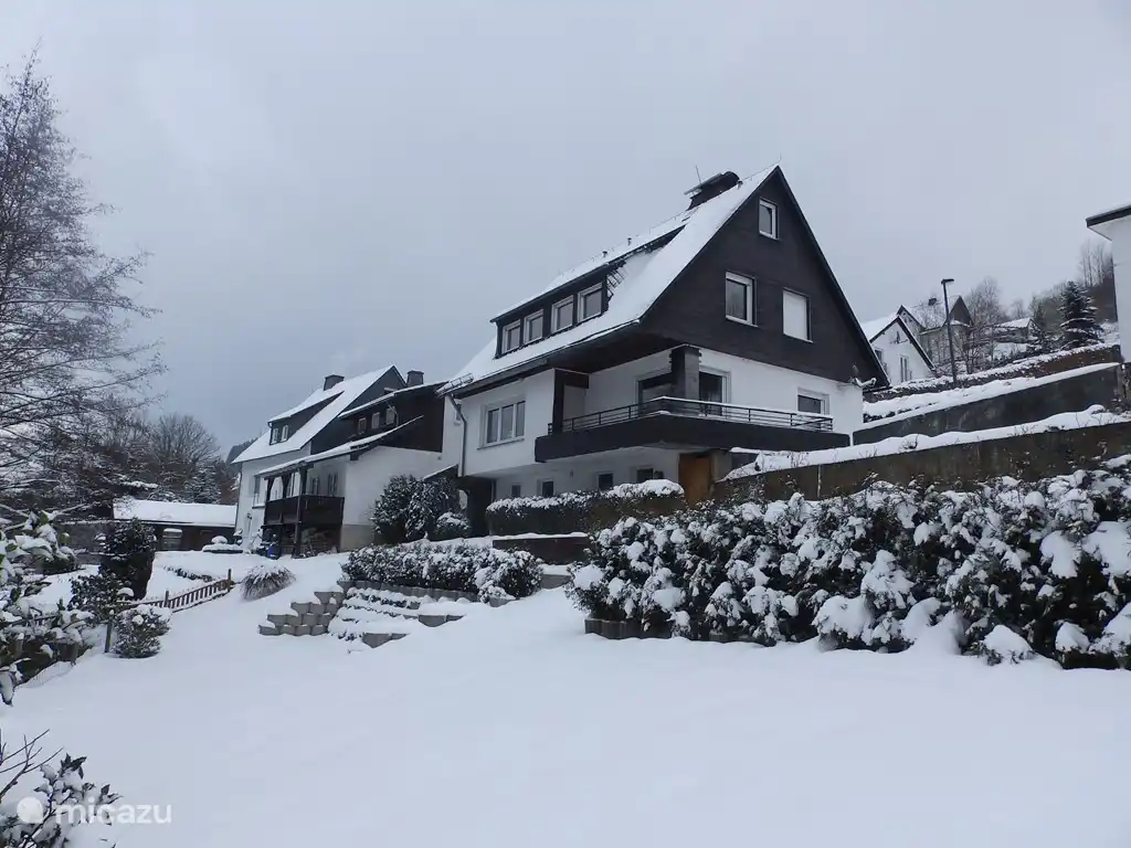 Fort Fun Winterwelt – Bestwig in Germany - a house with snow on the ground.