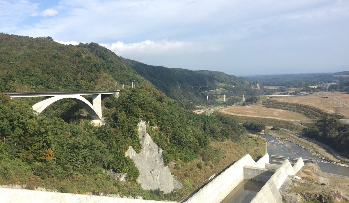 Fujisato Choei in Japan - a view of a bridge over a river.